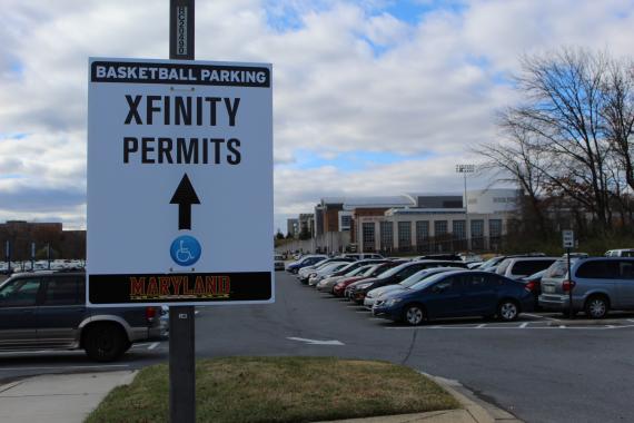 Directional sign for basketball parking.