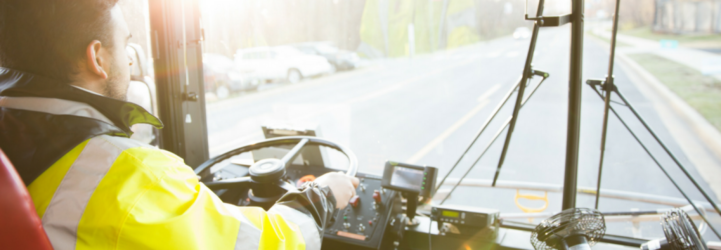 Bus driver driving bus